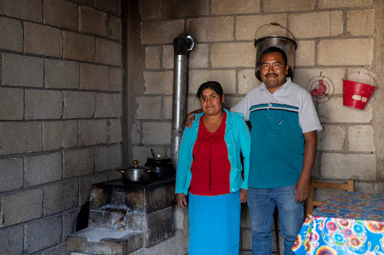 Microsol_Mexico couple beside their cookstove